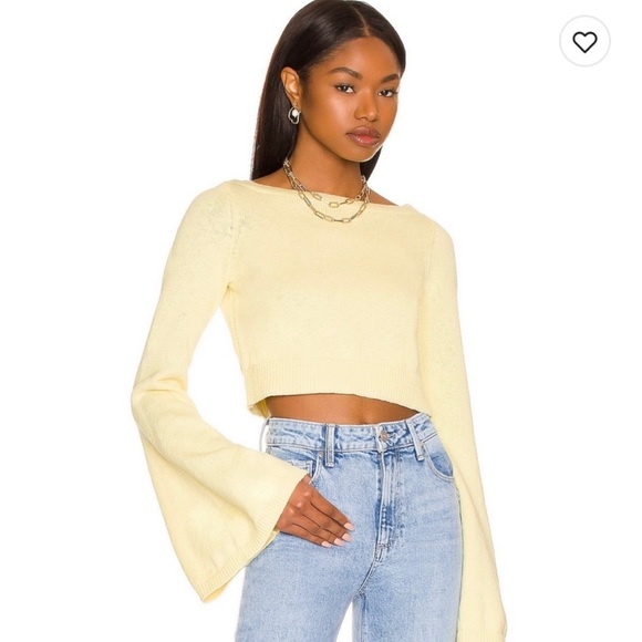 Revolve cropped sweater in pastel yellow. The Brand is lover and friends. - Picture 1 of 3
